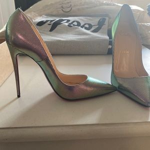 Size 40. Worn twice . Christian louboutin. Metallic colour